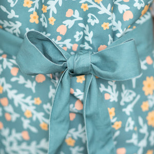 Kitchen Apron Collection close up image of blue floral apron
