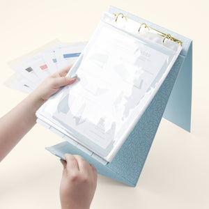 Lady opening Home Easel Binder