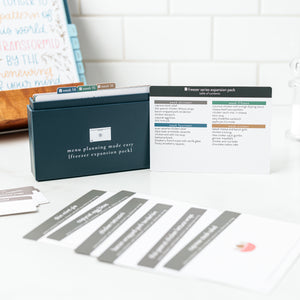 Freezer Expansion Pack with open box with Table of Contents and recipe cards on counter