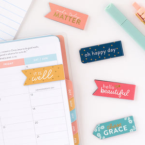 magnetic bookmarks on top of planner