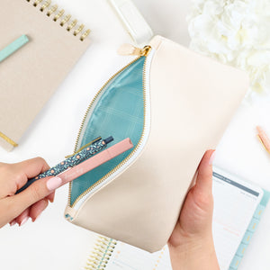 cream zipper pouch edition 2 with gel pens and highlighter