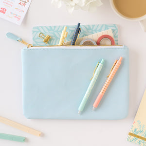 blue zipper pouch with accessories
