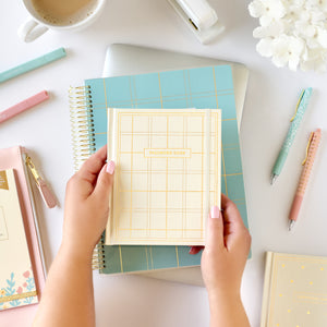 password book, edition 2 being held