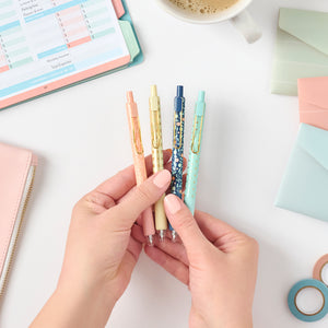 2nd edition gel pens being held