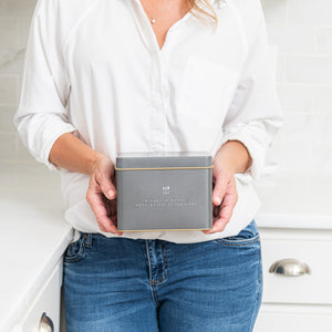 Lady holding Recipe Tin - Grey