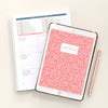 Home Planner pink floral on iPad along with printed version spiral bound