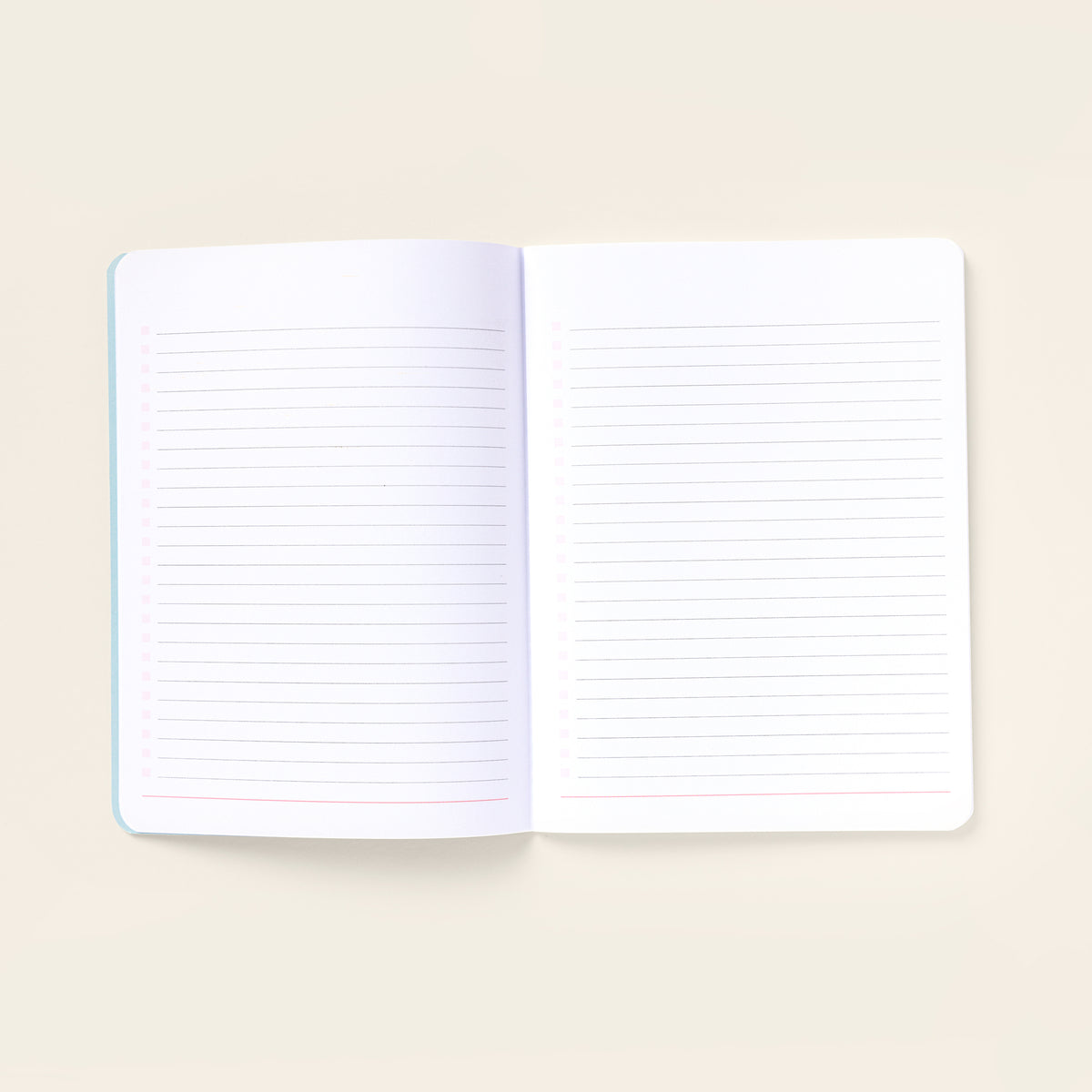 blank journal opened cream background