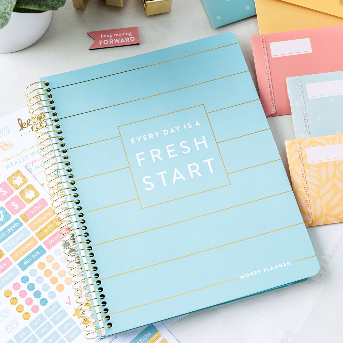 Money Planner with Envelopes and Stickers on counter