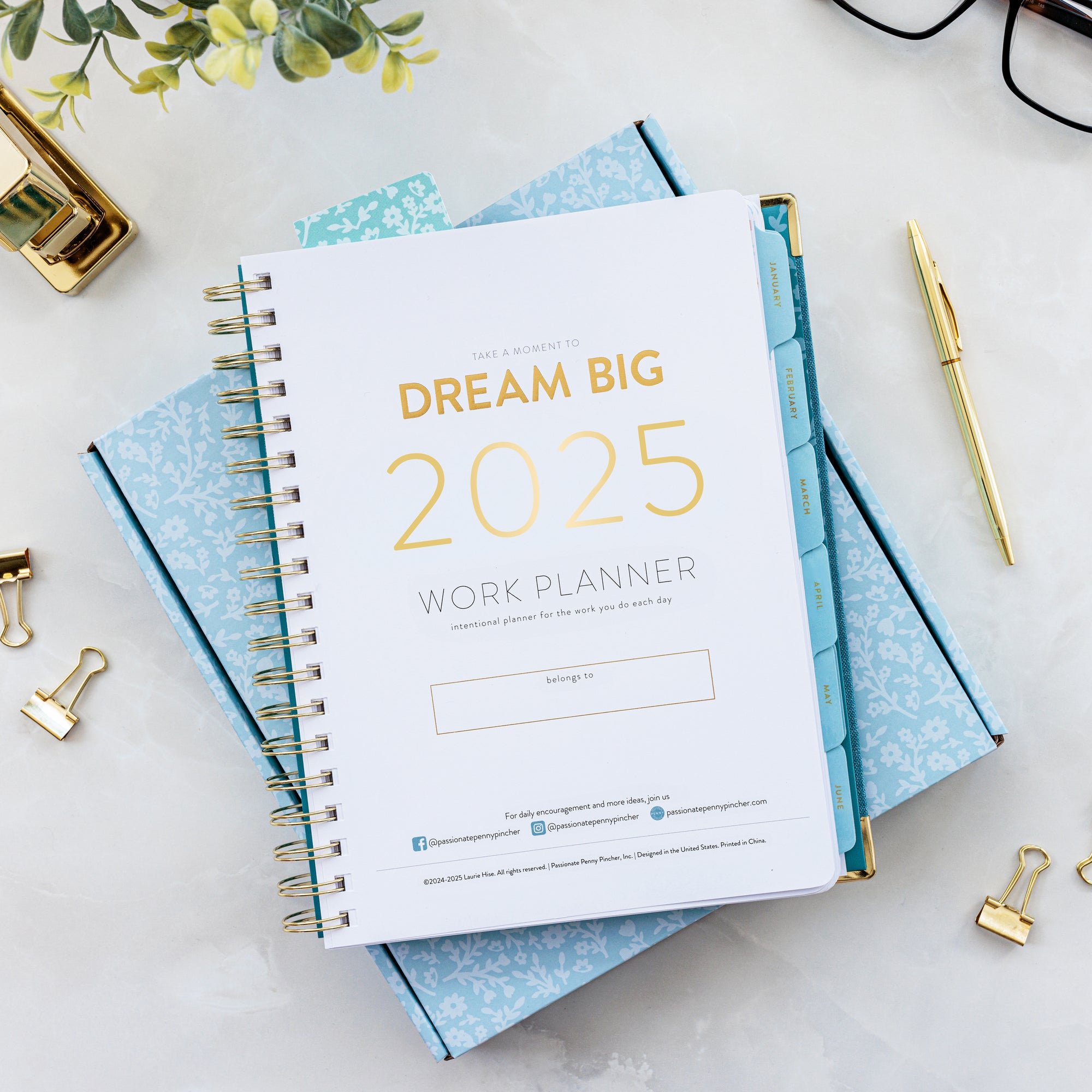 2025 work planner on counter with accessories 