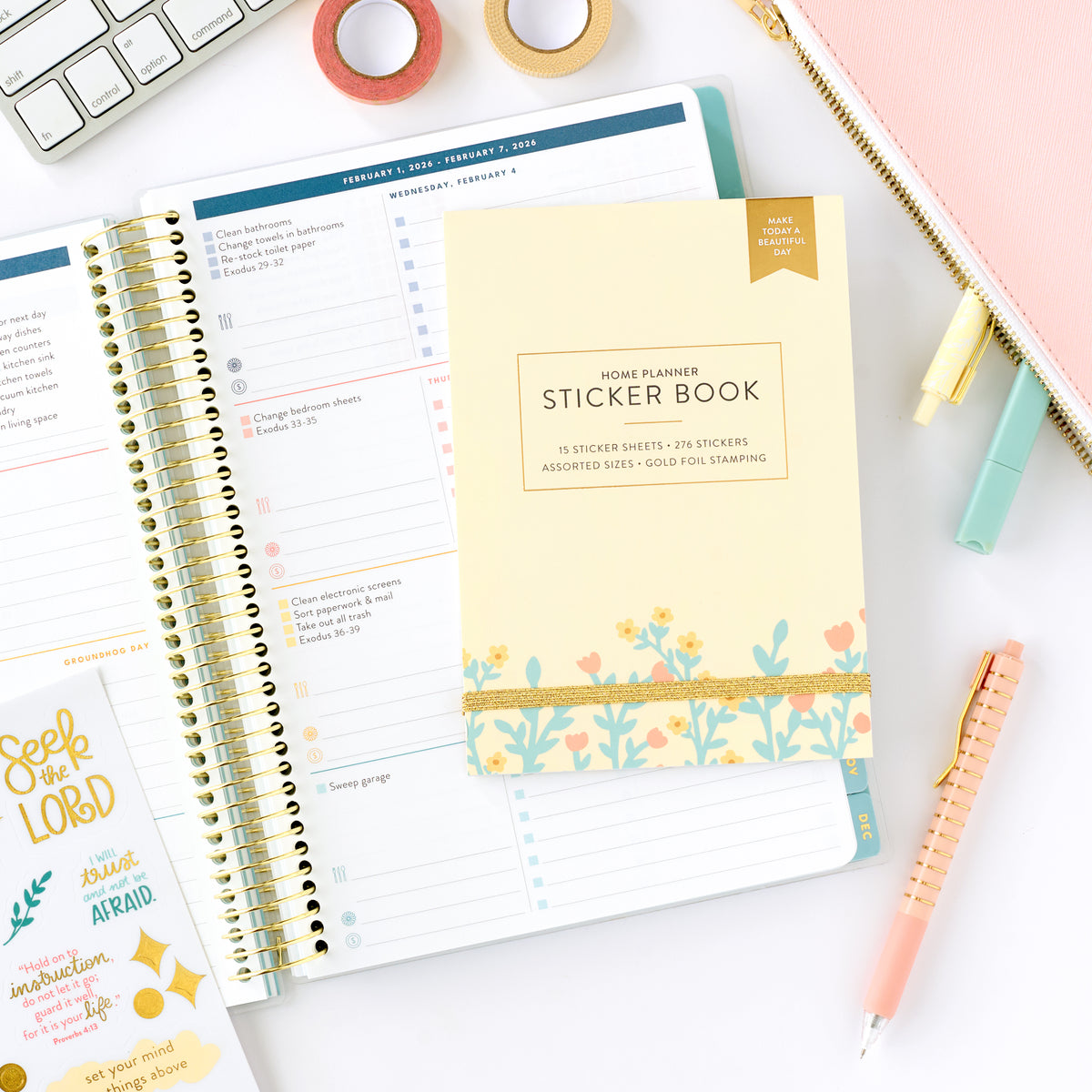 faith sticker book on top of home planner