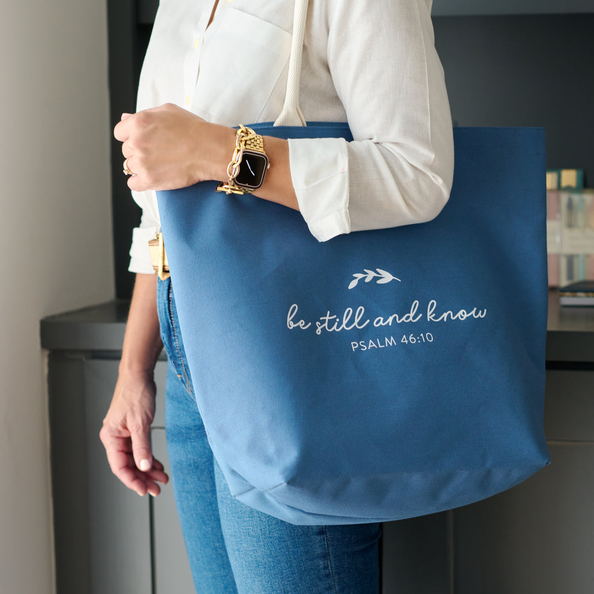 be still and know tote on arm