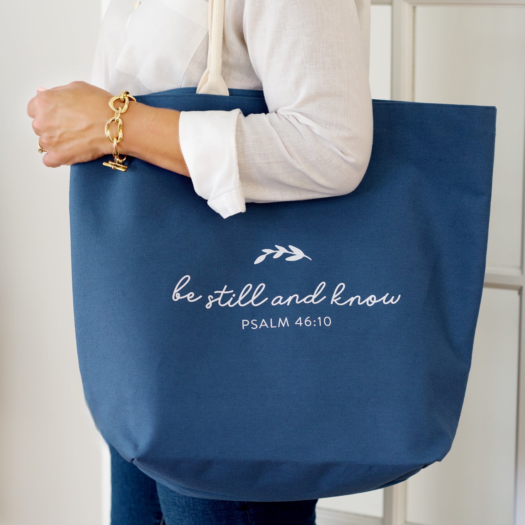 canvas totes being held