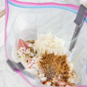 Meal prepped in zip-top bag using Freezer Stand