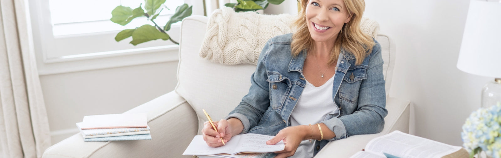 laurie in chair with home planner