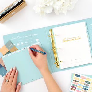 happy blue recipe binder with writing on tabs