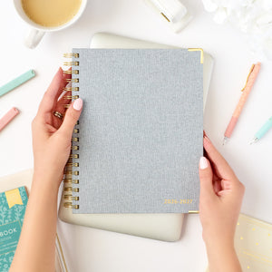 2026-27 chambray work planner being held