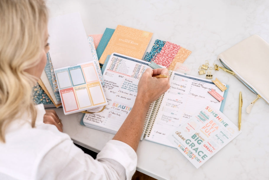 laurie writing in planner