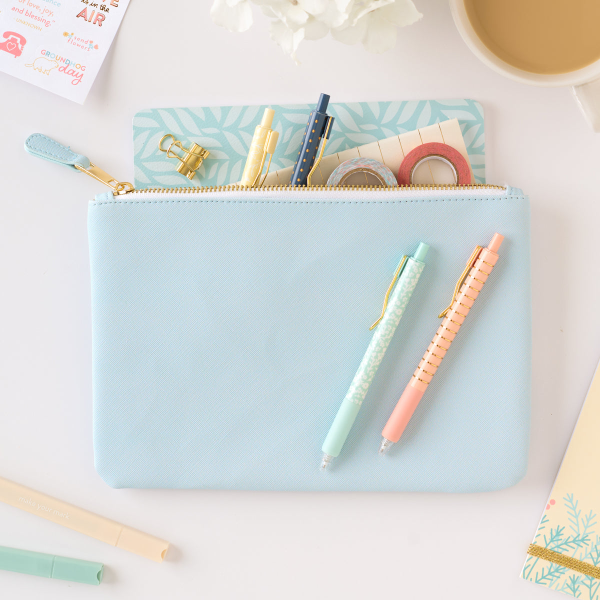 blue zipper pouch with accessories