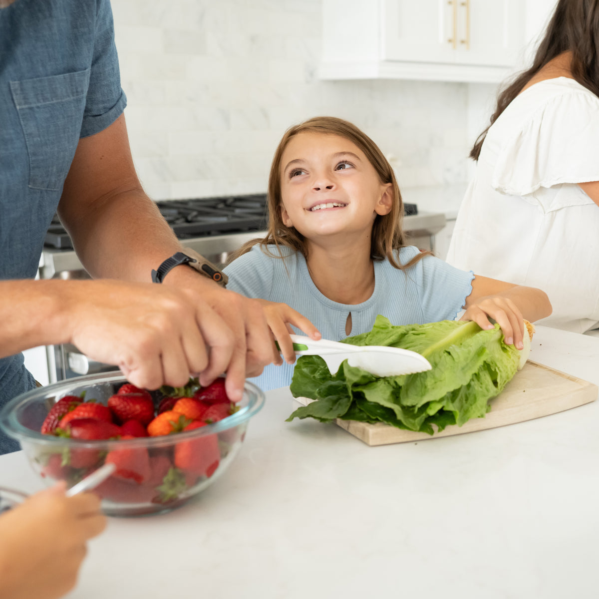 girl chopping lettuce