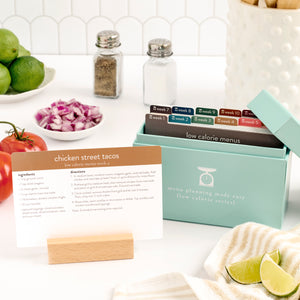 low calorie menu box with photos on counter