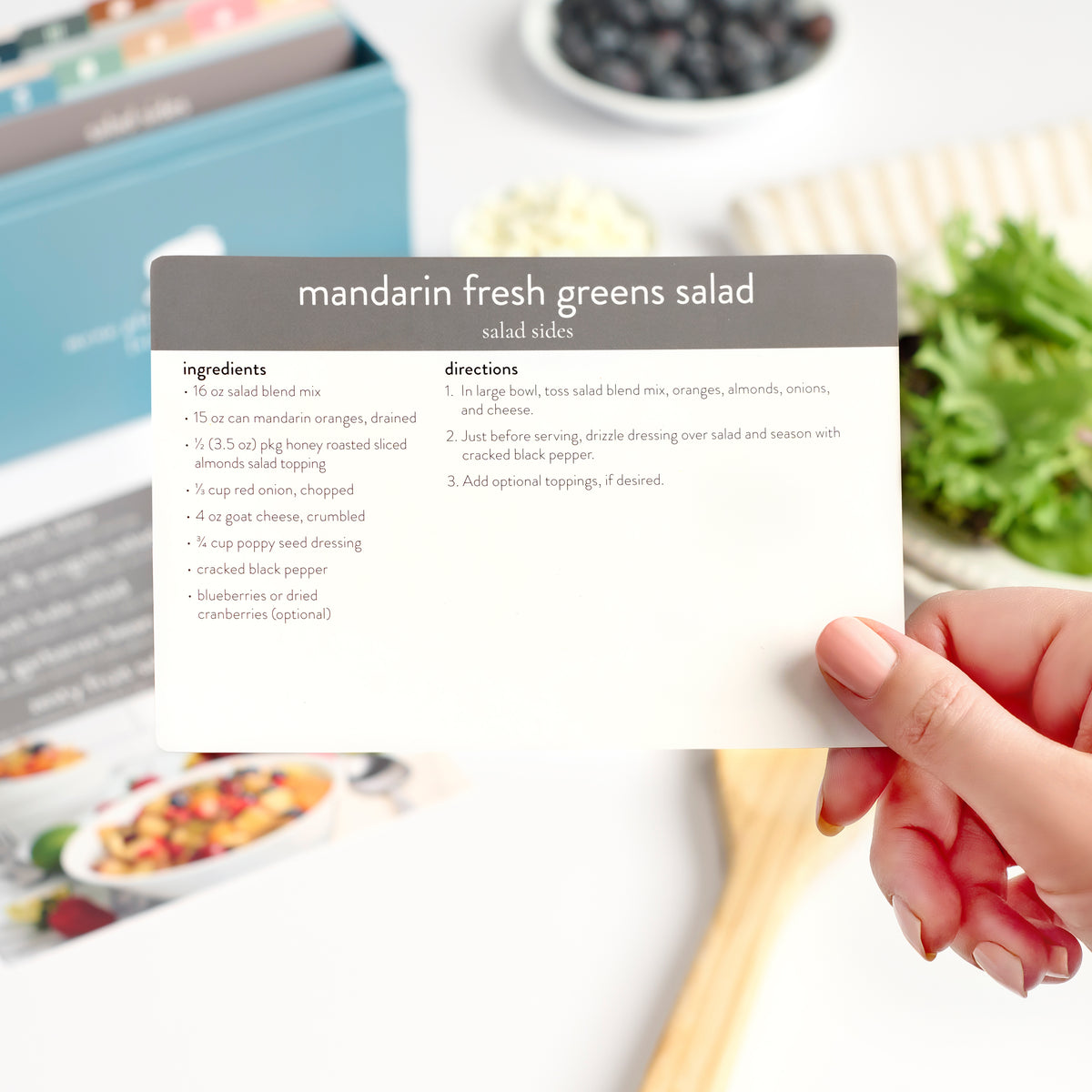 sides recipe card being held up