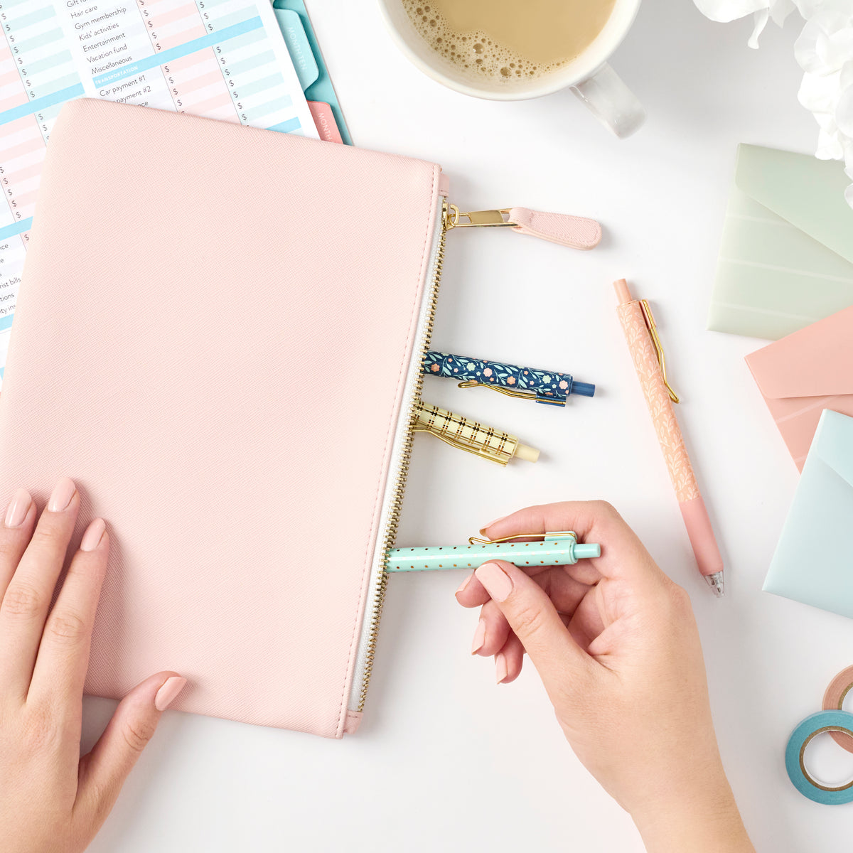 2nd edition gel pens inside pink zipper pouch