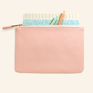 blush zipper pouch filled 