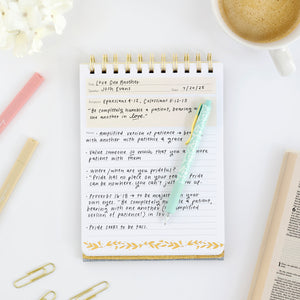 sermon note book with writing