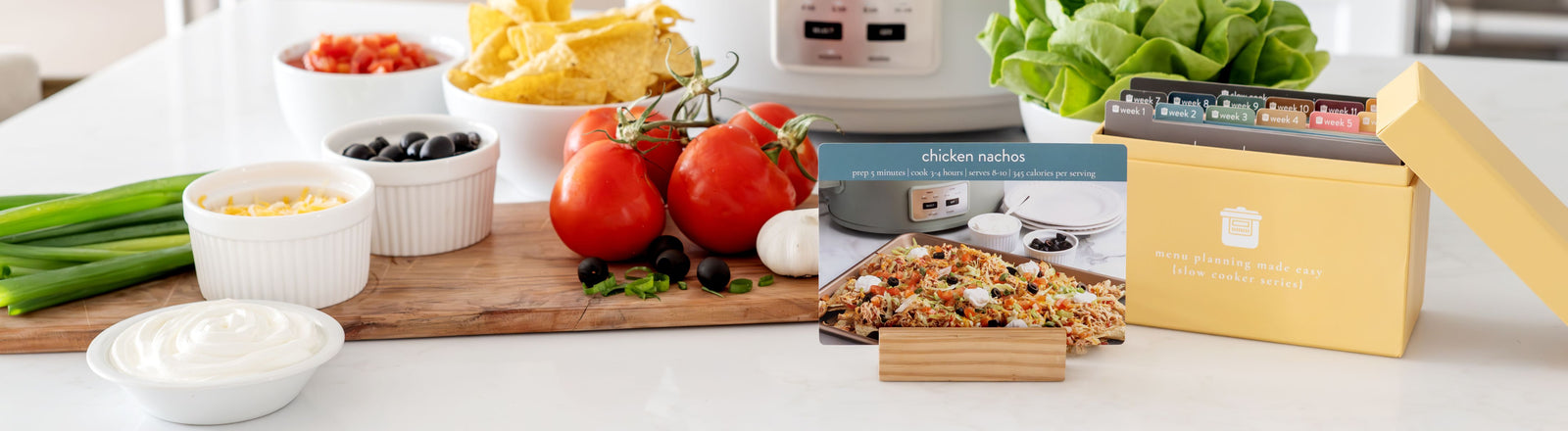 slow cooker box with ingredients on table