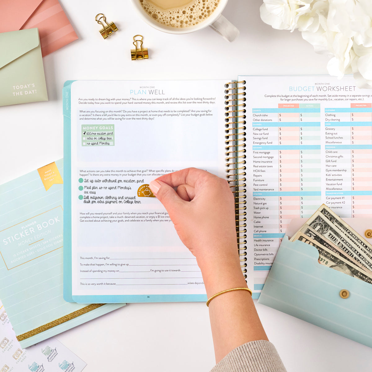 money planner sticker being put on money planner