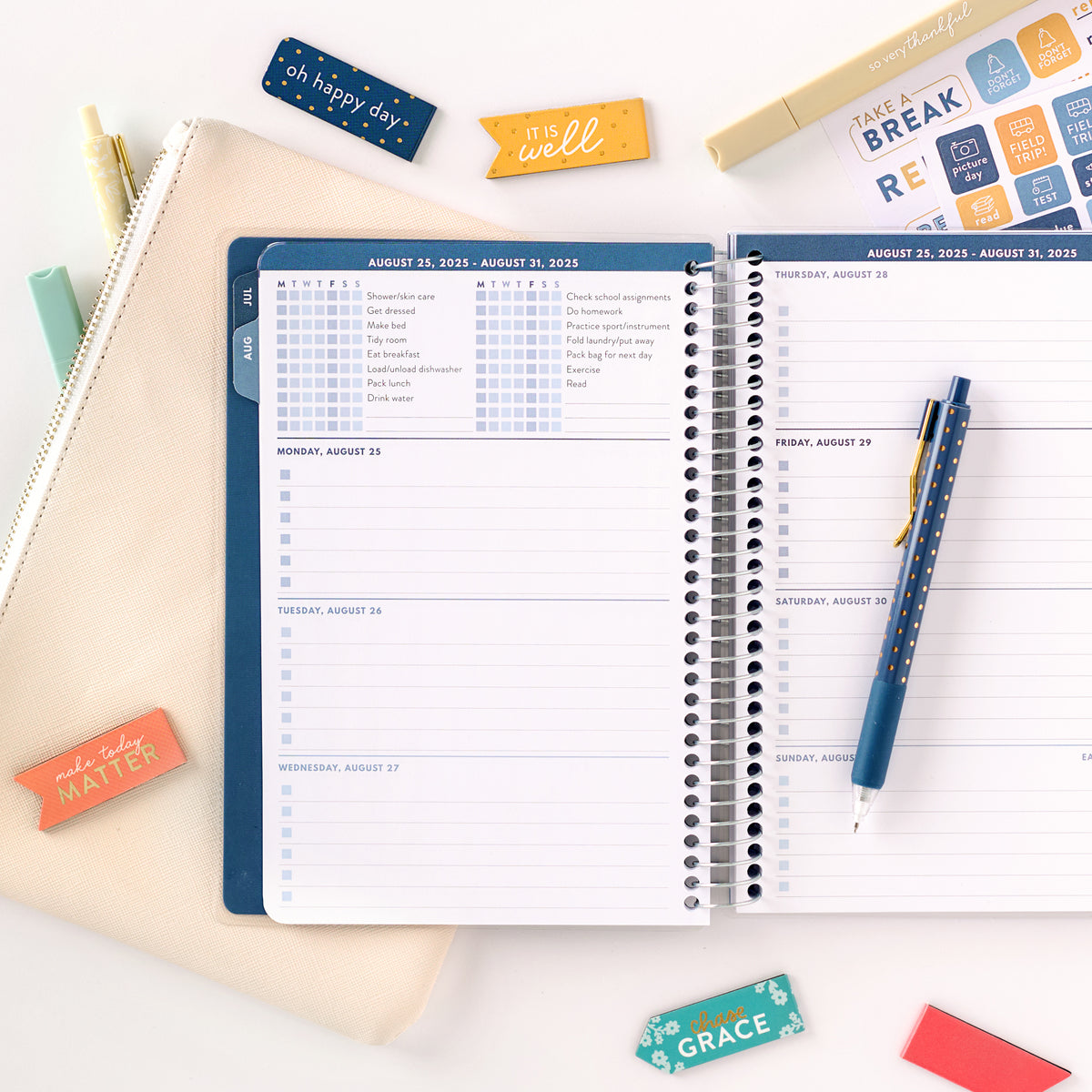 blue student planner with accessories