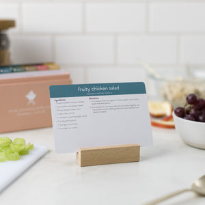 Wooden Block Recipe Card Holder  holding recipe card on counter