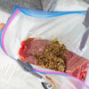 Summer Menu Series prepped Grilled Flat Iron Steak with Gourmet Butter in zip-top bag